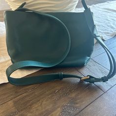 Stunning Dark Green Nwot J. Crew Convertible Crossbody Handbag. Item Has Removable Strap And Large Interior. It Is 11”X7”X3 1/2”. It Is In Excellent Condition! Green Hobo Bag With Adjustable Strap For On-the-go, Green Shoulder Bag With Adjustable Strap For Shopping, Green Hobo Bag With Adjustable Strap And Double Handle, Casual Dark Green Shoulder Bag For Everyday Use, Elegant Green Bucket Bag With Adjustable Strap, Chic Green Hobo Bag With Adjustable Strap, Versatile Green Shoulder Bag For Shopping, Green Bucket Bag With Detachable Strap, Green Bucket Bag With Detachable Strap And Double Handle