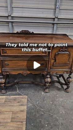 an old desk with words written on it