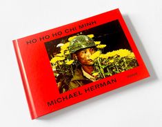 a red book with the cover of michael herman's ho ho chi minh