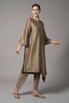 Brown chanderi kurta with placement embroidery. Paired with a pant. - Aza Fashions Fitted Asymmetrical Sets For Festive Occasions, Festive Fitted Sets With Asymmetrical Hem, Fitted Sets With Asymmetrical Hem For Festive Occasions, Elegant Festive Sets With Asymmetrical Hem, Festive Sets With Fitted Asymmetrical Hem, Festive Elegant Sets With Asymmetrical Hem, Eid Sets With Asymmetrical Hem And Dupatta, Festive Asymmetrical Fitted Sets, Eid Embroidered Kurta With Asymmetrical Hem