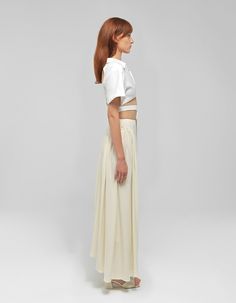 Materials: PoplinColors: WhiteDescription: Button up front top featuring a V neck and a clover cut out on the backDetails Button up front Clover cut out V-neckline Short sleeves Model wearing: SMADE IN ALBANIA BUST WAIST HIPS (cm)XS 84 64 94S 88 68 98M 94 72 102L 102 78 106XL 108 84 110CUSTOM SIZE: We can make any design custom based on your measurements. Customization is offered also about color and some design. Feel free to write us a message. Chic Short Sleeve Crop Top For Daywear, Chic Summer Blouse With Button Back, Pleated Midi Skirt, White Crop, Wrap Top, Asymmetric Hem, Custom Sizing, Midi Skirt, Cut Out