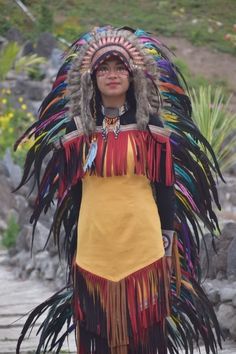 Costume Headpiece Inspired Native American Headdress - Rainbow Warbonnet Indian Headgear - Inspired Indian Headdress - Hat Feather Headdress **Item Description** This item is made of feathers, thread, and leather combination. Indonesia original handmade items. The real product may have slight variations and colors as we use nature/organic materials, but the final product will be 95% like the image listing. Can be use for normal head sizes. Express Mail Service(DHL) - Shipping Default  Take 4 - 7 shipping days to Worldwide with tracking number. You don't need to pay shipping upgrade. But i also offer Priority Shipping Service with 2-3 days of shipment. * Please provide your phone number when you checkout by sending etsy message. Please provide your phone number when you checkout by sending Native American Headdress, Indian Headdress, Feather Headdress, Costume Hats, Organic Materials, Colorful Rainbow, Headdress, Costume Accessories, Headpiece