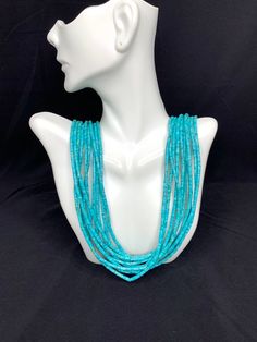 "Handmade in USA. Genuine 10 strands Kingman Turquoise heishi beads and silver necklace. The Turquoise heishi beads are 2x4mm. The necklace is 30\" long and closed with a sterling silver end cab and hook. You will receive item in the gift box. Thanks for looking and check out more items in my Etsy shop for more great items and deals! https://www.etsy.com/shop/925usa Payment: We accept all major credit cards through direct check out and Paypal. New Mexico residents have to pay sales tax. Payments Southwestern Multi-strand Turquoise Beads, Multi-strand Turquoise Gemstone Beads Necklace, Multi-strand Turquoise Gemstone Beads Necklace For Jewelry Making, Multi-strand Turquoise Necklace For Jewelry Making, Multi-strand Polished Turquoise Beads, Turquoise Multi-strand Hand-strung Necklaces, Hand-strung Multi-strand Turquoise Necklaces, Multi-strand Turquoise Necklace With Large Beads, Turquoise Multi-strand Hand-strung Necklace