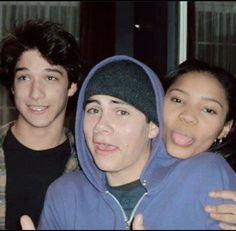 three young people posing for a photo together