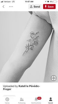 a woman's arm with a flower tattoo on the left side of her arm