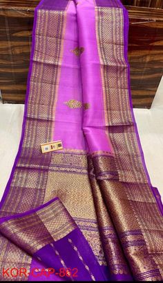 1.this is beautiful kora banarasi sari with running blouse piece 2.this sari is 5.5 mt length  3.this is a very elegant looking sari for all occasions like weddings and other formal events 4.fall n pico is complimentary  5.blouse can be made as per the requirements of the clients with proper measurements.stiching charges will be extra  6.plz check the availability of the sari before placing the order Bollywood Traditional Wear In Tussar Silk With Tilla, Chanderi Saree With Tilla Details, Chanderi Saree With Tilla, Traditional Chanderi Saree With Tilla, Unstitched Saree With Tilla Detailing, Unstitched Chanderi Traditional Wear With Tilla, Tussar Silk Saree With Tilla Detailing, Tussar Silk Saree With Tilla, Traditional Chanderi Wear With Tilla For Puja