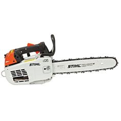 a chainsaw with an orange and black handle sitting on top of it's head