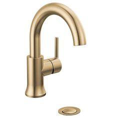 the faucet is shown in gold, and it has a single lever handle