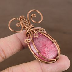 Natural Rhodonite, Handmade Pendant, Copper Pendant, Proposal Jewelry, Wire Wrapped Pendant, Oval Rhodonite, Rhodonite For Her, Pink Pendant, Best Return Gift, Rhodonite, Jewellery Handcrafted, Indian Jewelry, Jewelry For Women, Ethnic Jewelry, Pendant From India, Costume Jewelry, Bridal Pendant, Handmade Pendant, Simplistic Pendant, Cocktail Jewelry, Girls Pendant, Boho Pendant, Pendant For Bride, Handmade Pendant, Westernwear Jewelry, Delicate Pendant, Jewellery Handmade, Women Jewelry Copper Gifts, Handmade Wire Wrapped, Elegant Pendant, Handmade Wire