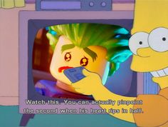 the simpsons is watching television with his face on