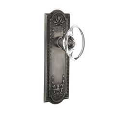 an old style door handle with glass knobs on the front and back of it