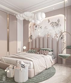 a bedroom with a large bed and lots of pillows on the floor, along with hanging lights