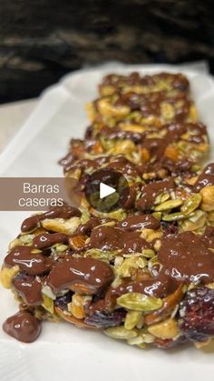 chocolate covered granola bars on a white plate