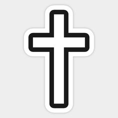 a black and white cross sticker on a gray background