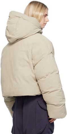 Down-filled enzyme-washed cotton canvas puffer jacket. · Bungee-style drawstring at hood and hem · Funnel neck · Zip closure with velcro placket · Welt pockets · Dropped shoulders · Extended sleeves · Inset rib knit cuffs · Zip pocket at interior · Fully lined Supplier color: Medium grey Fill: 90% duck down, 10% duck feather. Hooded Cotton Puffer Jacket For Cold Weather, Cotton Hooded Puffer Jacket With Double-lined Hood, Cotton Puffer Jacket With Double-lined Hood, Hooded Cotton Puffer Jacket With Padded Collar, Hooded Cotton Puffer Jacket With Pockets, Urban Cotton Hooded Puffer Jacket, Casual Hooded Cotton Puffer Jacket, Outdoor Cotton Puffer Jacket With Padded Collar, Hooded Cotton Puffer Parka