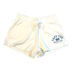 Feel like you're floating on a cloud in our ultra soft and silky Cape Cod Cloud Fleece Shorts. Perfect for a day at the beach or lounging at the beach club, these shorts feature a wave logo on the left pocket. Features include front pockets and waist-laces. Complete the look with our coordinating hoodie sweatshirt. Available exclusively for Cape Cod beach club members! ;) Cape Cod Beach, The Beach Club, Cape Cod Beaches, Wave Logo, Capes For Kids, Waves Logo, Fleece Shorts, Day At The Beach, Linen Apron