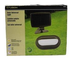 the solar powered lawn light is in its box