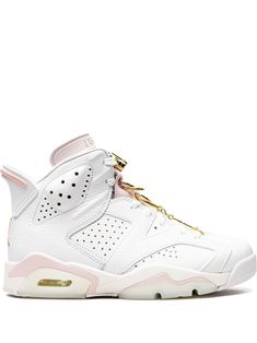 the nike air jordan 6 retro is in white and pink with gold detailing on the upper part