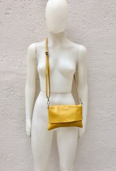 Leather bag in MUSTARD YELLOW . Natural, soft genuine leather. Small cross body bag in soft but strong leather. BOHO, Festival cross over bag.. Closed by a zipper and also a leather flap. The inside of the bag is fully lined in a strong nylon-cotton mix fabric eith a zipper closed pocket inside. Adjustable strap. Measurements: Width: 25 cm - 10 inch Height:18 cm - 7 inch This bag in different colors and other leather Bags by Good Times Barcelona: https://www.etsy.com/shop/goodtimesbarcelona?sect Yellow Leather Shoulder Flap Bag, Yellow Crossbody Flap Bag With Detachable Strap, Yellow Shoulder Flap Bag With Detachable Strap, Yellow Leather Flap Bag For Everyday Use, Yellow Crossbody Flap Bag With Adjustable Strap, Yellow Shoulder Flap Bag For Everyday Use, Yellow Flap Bag With Adjustable Strap For Everyday Use, Yellow Clutch Shoulder Bag For Everyday Use, Yellow Soft Leather Crossbody Shoulder Bag