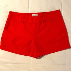 Calvin Klein Brand New/Never Worn Orange Shorts Calvin Klein Fitted Casual Shorts, Calvin Klein Fitted Shorts, Calvin Klein Cotton Shorts, Calvin Klein Spring Shorts, Calvin Klein Summer Shorts, Calvin Klein Casual Summer Shorts, Calvin Klein Casual Bottoms With Built-in Shorts, Casual Calvin Klein Bottoms With Built-in Shorts, Calvin Klein Shorts