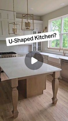 an image of a kitchen with the words u - shaped kitchen? on it's screen