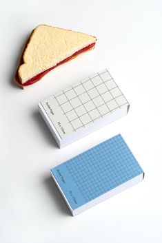 two pieces of bread sitting next to each other on top of a white countertop