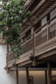 an old building with wooden balconies and balcony