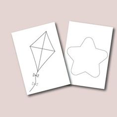 two blank cards with a kite drawn on one side and a star drawn on the other