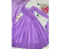 Lavender Anarkali Gown Bollywood Designer Anarkali Dress 3 pc Salwar kameez Flared gown Fully Stitched Dress Partywear gown Formal Wear gown You gonna love elegance with Modern touch ,Here we Presenting Exclusive Anarkali shoot Design  GOWN   :-  FABRICS & WORK    :- Georgette suit  SIZE         :- XS(34), S(36), M(38"), L(40"), XL(42"), XXL(44")* LENGTH   :- 47 INCH FLAIR       :- 4 MTR  LINING     :- Cotton  (Full Inner Top To Bottom) SLEEVES    :- Full Sleeves NECK TYPE    :- Round Neck DUPAT Full-length Anarkali Georgette Set, Fitted Floor-length Anarkali Set, Dabka Embellished Maxi Gown For Festive Occasions, Semi-stitched Anarkali Gown With Self Design, Festive Party Lehenga Long Dress, Semi-stitched Anarkali Gown Of Maxi Length, Semi-stitched Anarkali Gown In Maxi Length, Long Sleeve Navratri Party Gown, Long Sleeve Party Gown For Navratri