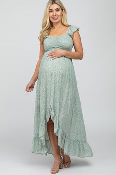 A comfortable & casual maternity dress perfect for any day!  A floral maternity maxi dress with a sweetheart neckline, a smocked bodice, flutter accent sleeves, and a hi-low hemline. The Sage Floral Smocked Hi-Low Maternity Maxi Dress is perfectly bump-friendly! Spring Dresses Maternity, Maternity Dresses Casual, Green Maternity Dresses, Casual Maternity Dress, Pink Blush Maternity Dress, Maternity Dresses For Baby Shower, Floral Maternity Dresses, Maternity Dresses Summer, Spring Maternity