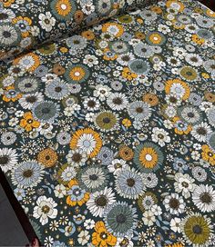 an image of a bed with flowers on it