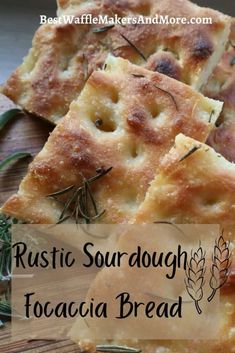 rustic sourdough focacia bread on a cutting board with rosemary sprigs