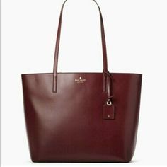 Kate Spade Janie Medium Tote Burgundy Smooth Leather Color Code: Cherrywood (610) New With Tags. Authenticity Guaranteed! Wkru6263 / Retail $329 Smooth Leather 11.6"H X 12.8" (Bottom) - 17" (Top) W X 5.5"D Drop Length: 11" Two Way Spade Jacquard Lining Tote With Zip Closure Interior Zipper And Double Slide Pockets Gold Foil Embossed Logo Dust Bag Not Included Imported Style # Wkru6263 Elegant Kate Spade Bags For Fall, Kate Spade Leather Bags For Fall, Kate Spade Burgundy Leather Bag, Brown Leather Kate Spade Bag, Elegant Brown Kate Spade Bag, Elegant Kate Spade Brown Bag, Kate Spade Everyday Bag In Tan, Classic Brown Kate Spade Bag, Kate Spade Tan Leather Bag