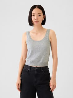 Supersoft cotton-blend cropped tank top.  Scoop neck.  Sleeveless.  Banded hem.  Fit: Close to the body.  Cropped, hits at the waist.  Models wearing Gap Tank Crop Top Outfit, Gray Tank Outfit, Tank Crop Top, Tank Outfit, Gap Sweater, Crop Top Outfits, Gray Tank, Ethereal Art, Cropped Tank Top