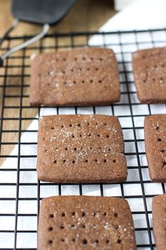 four cookies cooling on a wire rack