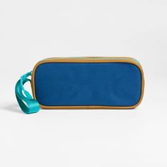 A fun pencil case that's built to handle all the thrills of the day. Colorblocked in rich navy blue and ochre, the bag has a contrasting aqua zipper, zipper pull and loop handle for the perfect finish. Constructed of supremely durable polyester fabric that includes recycled plastic bottles, our roomy, easy-clean case makes it simple to keep all their pens and pencils organized and accessible. Pair with the Colorblock Navy and Ochre lunch box and matching backpack for a totally coordinated look. Blue Pouch Pencil Case For Everyday Use, Modern Blue Pencil Case For Personal Use, Modern Blue Pencil Case, Blue Pencil Case With Removable Pouch, Playful Blue Rectangular Pencil Case, Kids Pencil Case, Pencil Organizer, Backpack Gift, Kids Gear