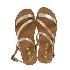 These Soda Sandals Add A Touch Of Elegance With Their Gold Strappy Design. They Feature A Durable Rubber Sole For Comfort And Stability. Ideal For Casual Summer Outings, The Adjustable Buckle Ensures A Secure Fit. The Stylish And Versatile Design Pairs Effortlessly With A Variety Of Outfits. Rubber Sole Adjustable Buckle Gold Strappy Design Casual Summer Flats Gold Strappy Slingback Sandals For Summer, Gold Adjustable Slingback Sandals For Summer, Casual Gold Strappy Sandals, Gold Strappy Sandals For Vacation, Gold Ankle Strap Sandals For Summer, Gold Ankle Strap Summer Sandals, Soda Sandals, Casual Summer Flats, Gold Strappy Sandals