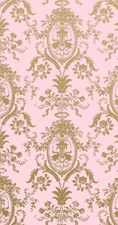 a pink and gold wallpaper with an ornate design on the bottom half of it