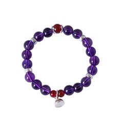 Crafted with 925 silver and adorned with an elegant amethyst lotus charm, this bracelet exudes a timeless sophistication. The amethyst is known for its calming and healing properties, making this bracelet not only a beautiful accessory but also a potential source of positive energy. Tarnish proof Water proof Sleep / Nap proof Safe for sensitive skin Wear it while working out &showering Designed to wear 24/7 If there is no stock, the product will take 15 days to produce Please leave your usual email address for order contact For smooth delivery, please leave your phone number Natural materials may have cracks, cotton wool, brown spots, mineral defects, etc., which are not defects but normal phenomena. They will not affect wearing and will not be used as reasons for returns or exchanges. Det Purple Amethyst Charm Bracelet For Gift, Purple Amethyst Charm Bracelet Gift, Elegant Sterling Silver Healing Crystal Bracelet, Purple Spiritual Charm Bracelet For Healing, Elegant Purple Crystal Bracelet For Meditation, Elegant Purple Crystal Meditation Bracelet, Silver Gemstone Crystal Bracelet For Meditation, Elegant Purple Crystal Bracelet For Healing, Elegant Gemstone Beads Charm Bracelet For Healing