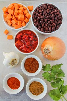 the ingredients to make this chili include beans, carrots, cilantro, and red pepper