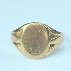 A Fine Men's Signet Ring, Circa 1950's. Oval Center With Letter "D" Monogram. Double Groove On Shanks. Ring Top Is 15.58mm. Ring Size 13.5 , Weight 5.8g, Assay 10k Gold Round Signet Ring With Maker's Mark, Gold Signet Ring With Maker's Mark, Classic Yellow Gold Signet Ring With Maker's Mark, Classic Yellow Gold Engraved Ring With Maker's Mark, Classic Engraved Yellow Gold Ring With Maker's Mark, Gold Engraved Ring With Maker's Mark, Collectible, Yellow Gold Antique Signet Ring With Maker's Mark, Antique Yellow Gold Signet Ring With Maker's Mark, Formal Engraved Ring With Maker's Mark