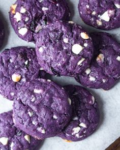 purple cookies with white chocolate chips on top