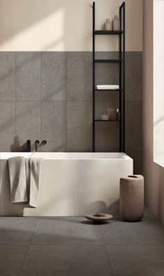 a white bath tub sitting under a window next to a shelf