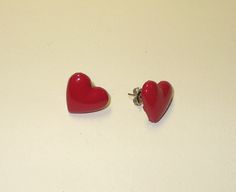 "Adorable pair of red heart painted metal post earrings. Hearts measure 3/4\" across. Please check out all of our great vintage deadstock jewelry and accessories in our ETSY store SHOPHULLABALOO. Thanks! The Hullabaloozers" Red Vintage Heart Earrings, Retro Heart-shaped Earrings For Valentine's Day, Retro Heart Earrings For Valentine's Day, Vintage Red Heart Earrings For Pierced Ears, Retro Earrings For Valentine's Day Gift, Red Vintage Heart Earrings For Gifting, Red Enamel Earrings For Valentine's Day, Red Vintage Heart Earrings For Gift, Vintage Red Heart Earrings As Gift