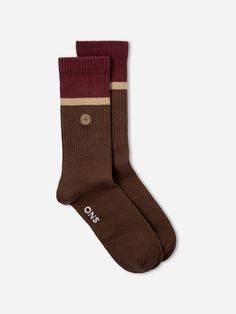 Dark Earth/Wine Red Stripe ONS Stripe Socks Logo Stretch Casual Fall Socks With Ribbed Cuffs, Striped Socks For Winter Stocking Stuffer, Striped Socks For Stocking Stuffers In Winter, Casual Socks With Ribbed Cuffs For Fall, Casual Brown Socks For Fall, Brown Ribbed Winter Socks, Cozy Cotton Ribbed Socks, Cozy Ribbed Cotton Socks, Striped Cotton Socks For Winter