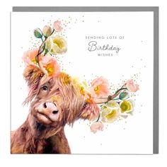 a birthday card with an image of a cow wearing flowers on it's head