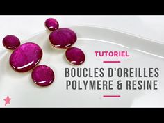 three purple stones sitting on top of a white plate with the words tuoriel