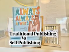 there is a book on top of a desk with the title, traditional publication vs self - publishing