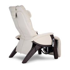 the reclining chair is white and has black trimmings on its back legs