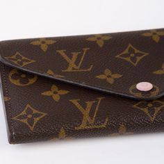 Expertly crafted from Louis Vuitton's signature monogram printed canvas, the Josephine wallet is the ideal accessory to hold all your cards and bills. With its pretty, baby pink interior feature, this wallet is elegant as well as functional. Featuring numerous compartments for bills, receipts, cards, and anything else that ends up in your wallet, the Josephine can carry it all. A classic piece from LV, this wallet will remain in your collection forever. SPL Exterior Louis Vuitton monogram canvas Pink button closure Envelope silhouette Excellent condition Interior Pink canvas top and bottom flap Monogram canvas middle section Four credit card slots One compartment for bills One large compartment or ID card and receipts One flat pocket for notes Excellent condition SPL Height 9.5cm Width 19c Pink Canvas, Pink Interior, Monogram Prints, Printed Canvas, Dior Shoes, Exclusive Bag, Casual Backpack, Chanel Handbags, Handbag Backpack